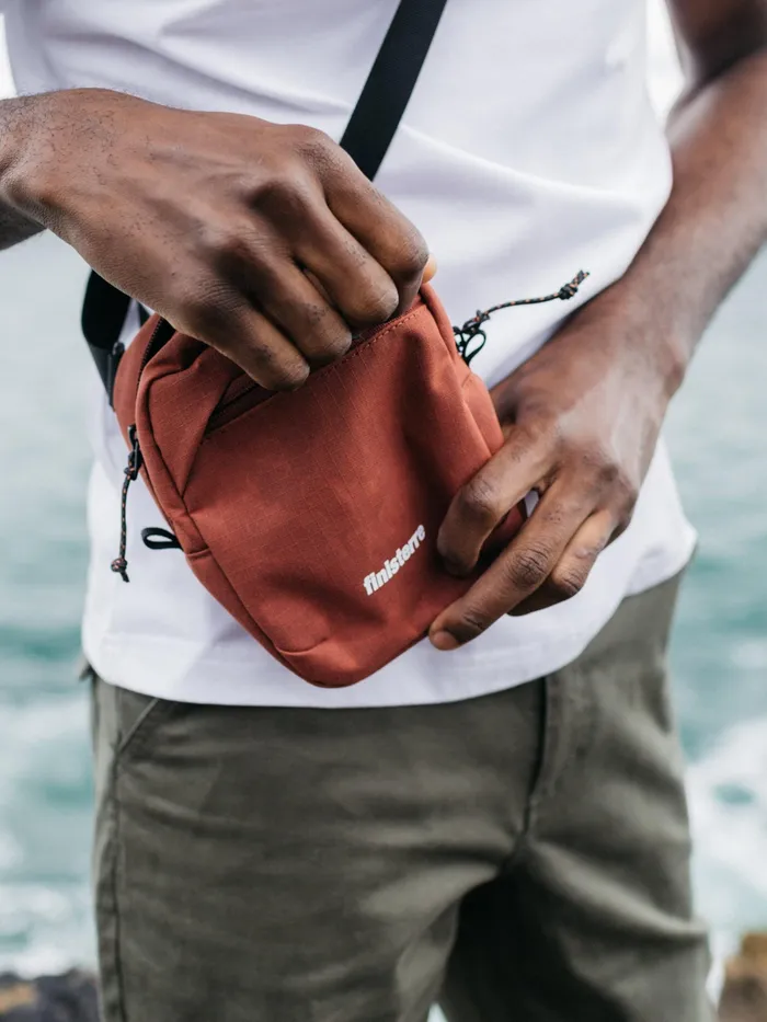 Finisterre Bags MenWomen Nautilus Pocket Pack Bag Dark Rosewood