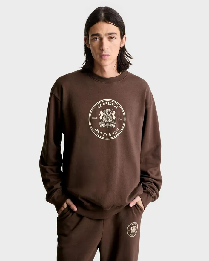Sporty and Rich Sweatshirts Women Bristol Crest 100th Crewneck 8211 ChocolateCream